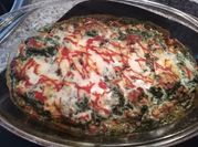 Una foto de lasagna patata jamón york