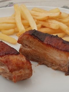 Una foto de Costillas con miel y barbacoa