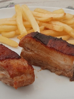 Una foto de Costillas con miel y barbacoa