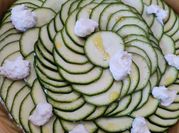 Une photo de tian courgette