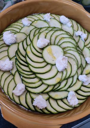 Une photo de Tian de Courgettes ricotta/menthe/parmesan