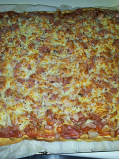 Una foto de Pizza familiar