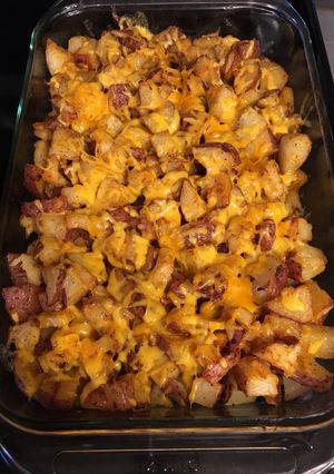 Una foto de Papas ranch y queso cheddar