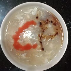 A picture of Chicken corn soup.