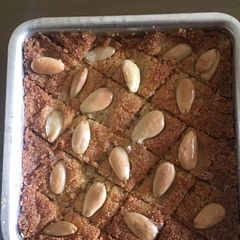 A picture of Basbousa (coconut and suji cake).