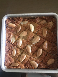 A picture of Basbousa (coconut and suji cake).