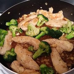 A picture of Chicken and Broccoli with a asian flair.