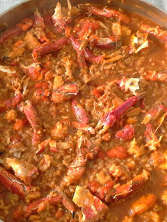 Una foto de Arroz de centolla