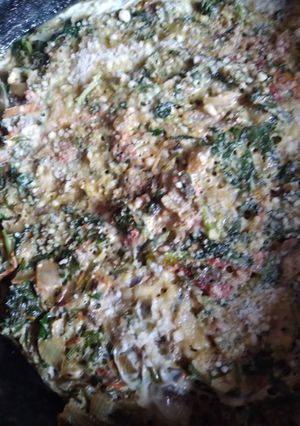 Una foto de Tortilla de capuchina y queso parmesano