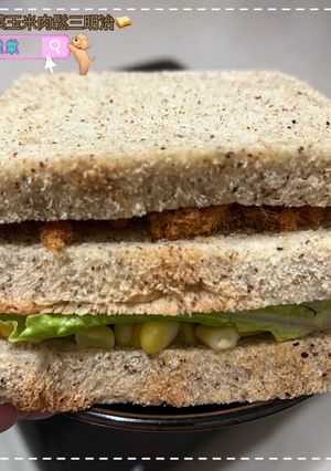 A picture of Lettuce, Corn, and Pork Floss Sandwich.
