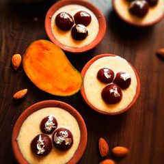 A picture of Gulab Jamun in Mango Rabdi.
