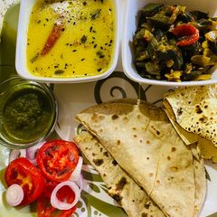 A picture of Quick dinner with Bhindi (okra)and kadhi.