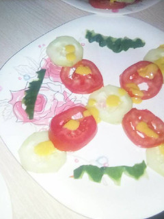 A picture of Cucumber and tomato salad.