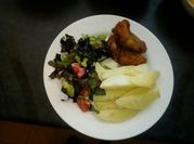 A picture of chip with salad