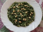 Una foto di risotto al cavolo nero