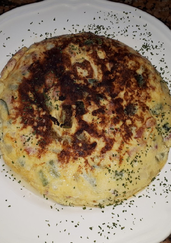 Una foto de Tortilla de calabacín con baicon
