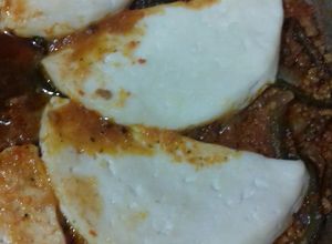 Una foto de Rajas de poblano con picadillo y queso fresco