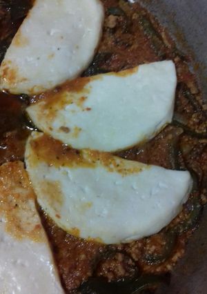 Una foto de Rajas de poblano con picadillo y queso fresco