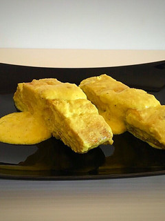 Una foto de Corvina en salsa de cúrcuma