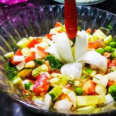 A picture of Kachumar salad in Italian style.
