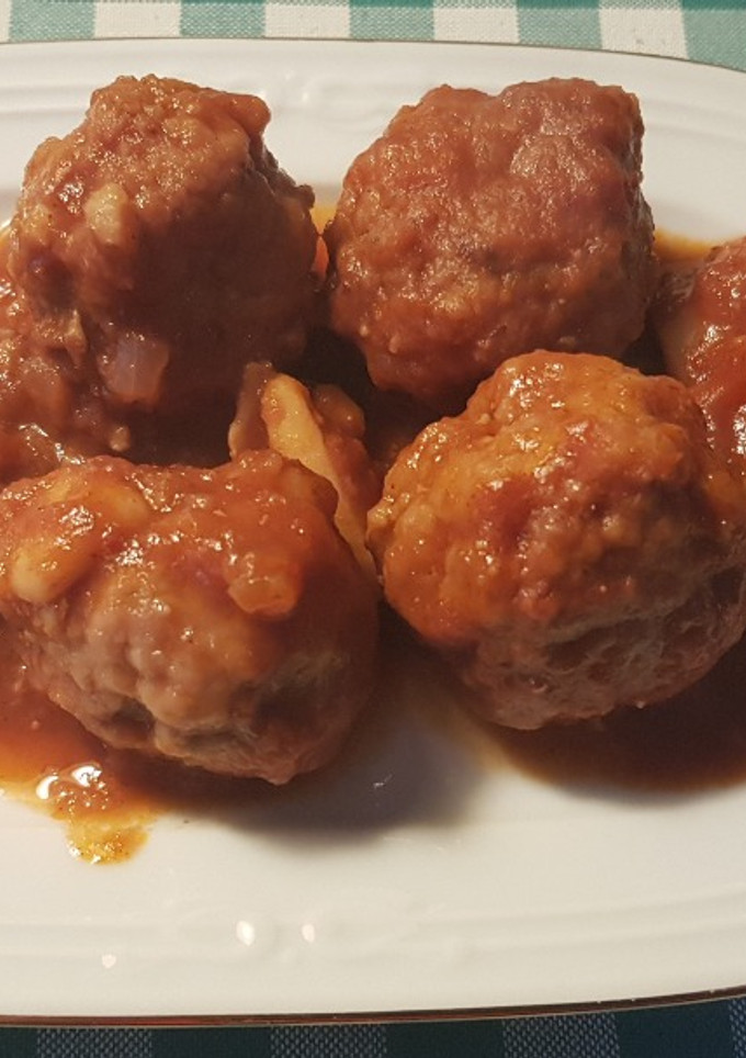 Una foto de Mandonguilles  amb calamars i sèpia