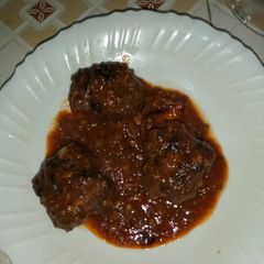 Meat balls in garlic tomato sauce A picture of Meat balls in garlic tomato sauce.