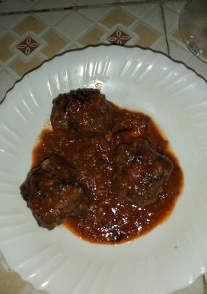 A picture of Meat balls in garlic tomato sauce.