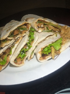A picture of Chicken roti wraps.
