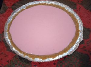 Una foto de Pay de queso-fresa