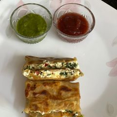 A picture of Cheesy Palak Paneer Lifafa.