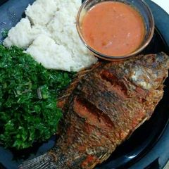 A picture of Fish and kales.