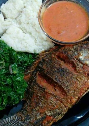 A picture of Fish and kales.