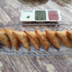 A picture of Chicken cheese samose.