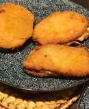 Libritos de lomo en adobo rellenos de queso y pavo
