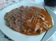 Una foto de churrasco chileno