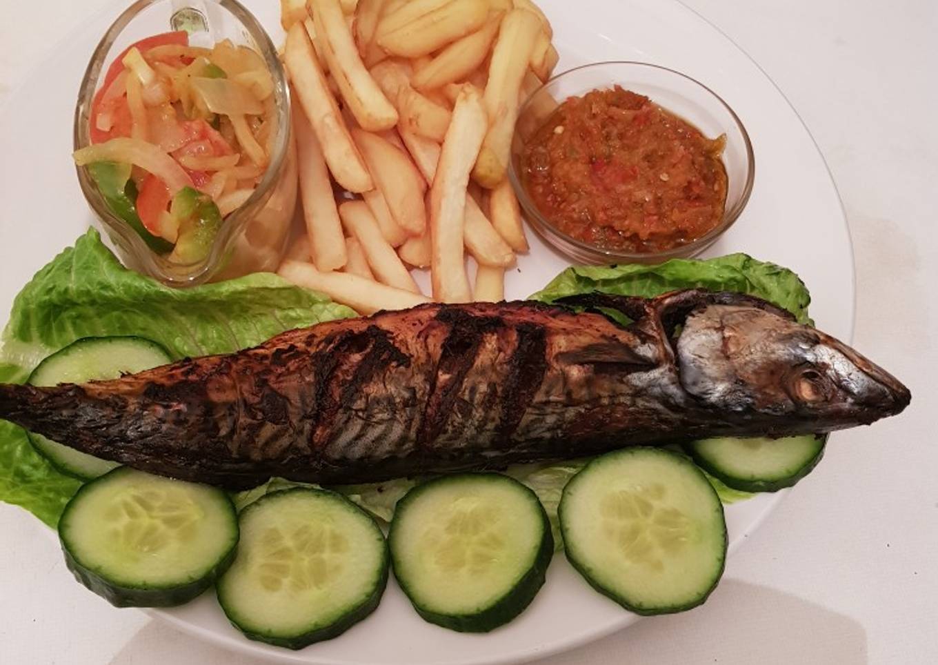 Chips and grilled Mackerel fish