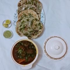 A picture of Aloo kulcha naan.