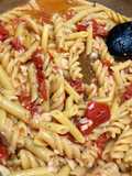 Pasta con ragù di pesce bianco