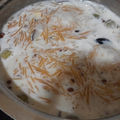 A picture of Sugar mix milk vermicelli kheer.