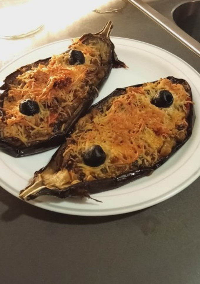 Una foto de Berenjenas rellenas de verduras