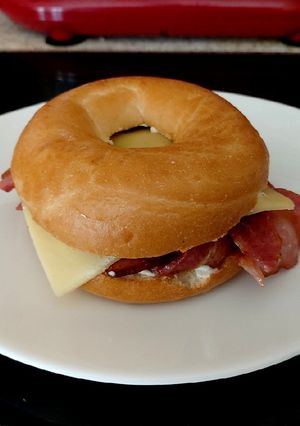 A picture of My Smoked Streaky Bacon Bagel With Cheese 🥰.