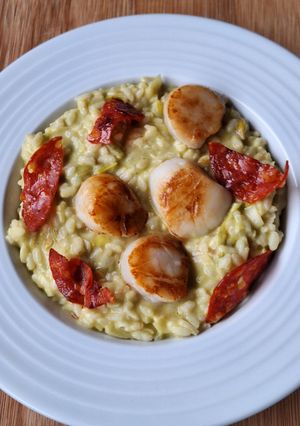 A picture of Scallop Risotto with Leeks and Chorizo Chips.