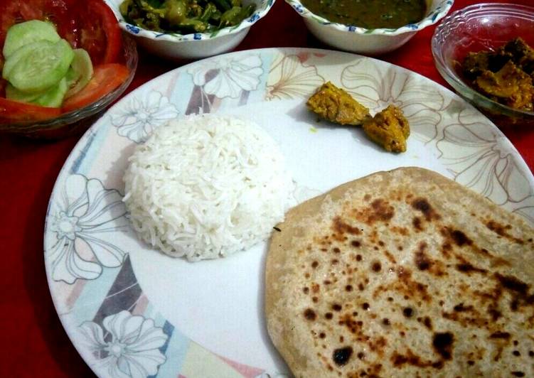 Dal,rice,chapati,bhindi with salad and pickle