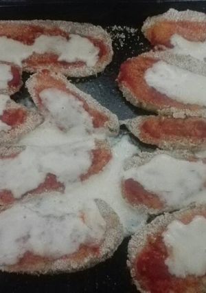 Una foto de Milanesas de berenjena napolitana