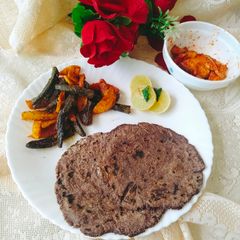 A picture of RAGI PARATHA with Aloo Bhindi SABJI.
