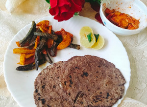 A picture of RAGI PARATHA with Aloo Bhindi SABJI.