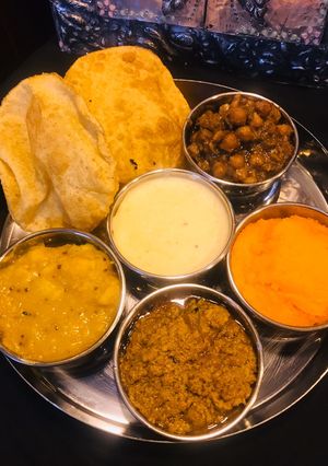 A picture of Halwa poori thalliPart 4 (fry seekh kabab).