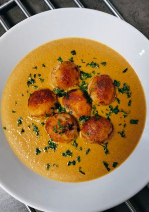 A picture of Baked Meatballs in Spanish Sauce.