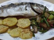 Una foto de dorada papillote