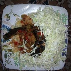 A picture of Cat fish pepper soup served with couscous.